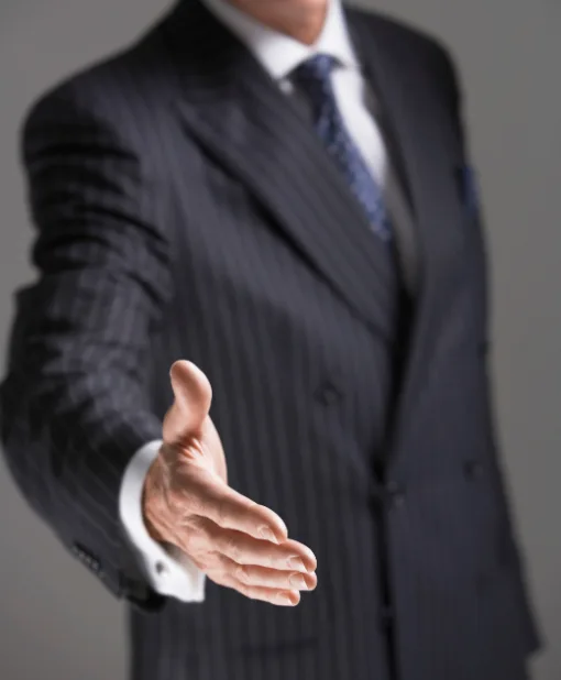 Business man offering handshake