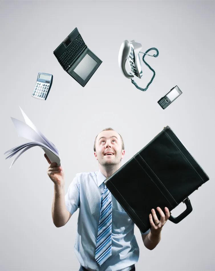 Businessman juggling